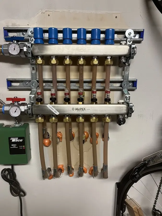 Plumber performing Water Heater Repair at a residential property in Randallstown